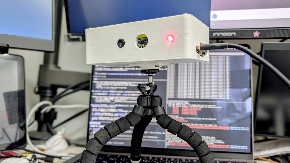 TerraGuard AI crow detector in a 3D-printed case on a small tripod